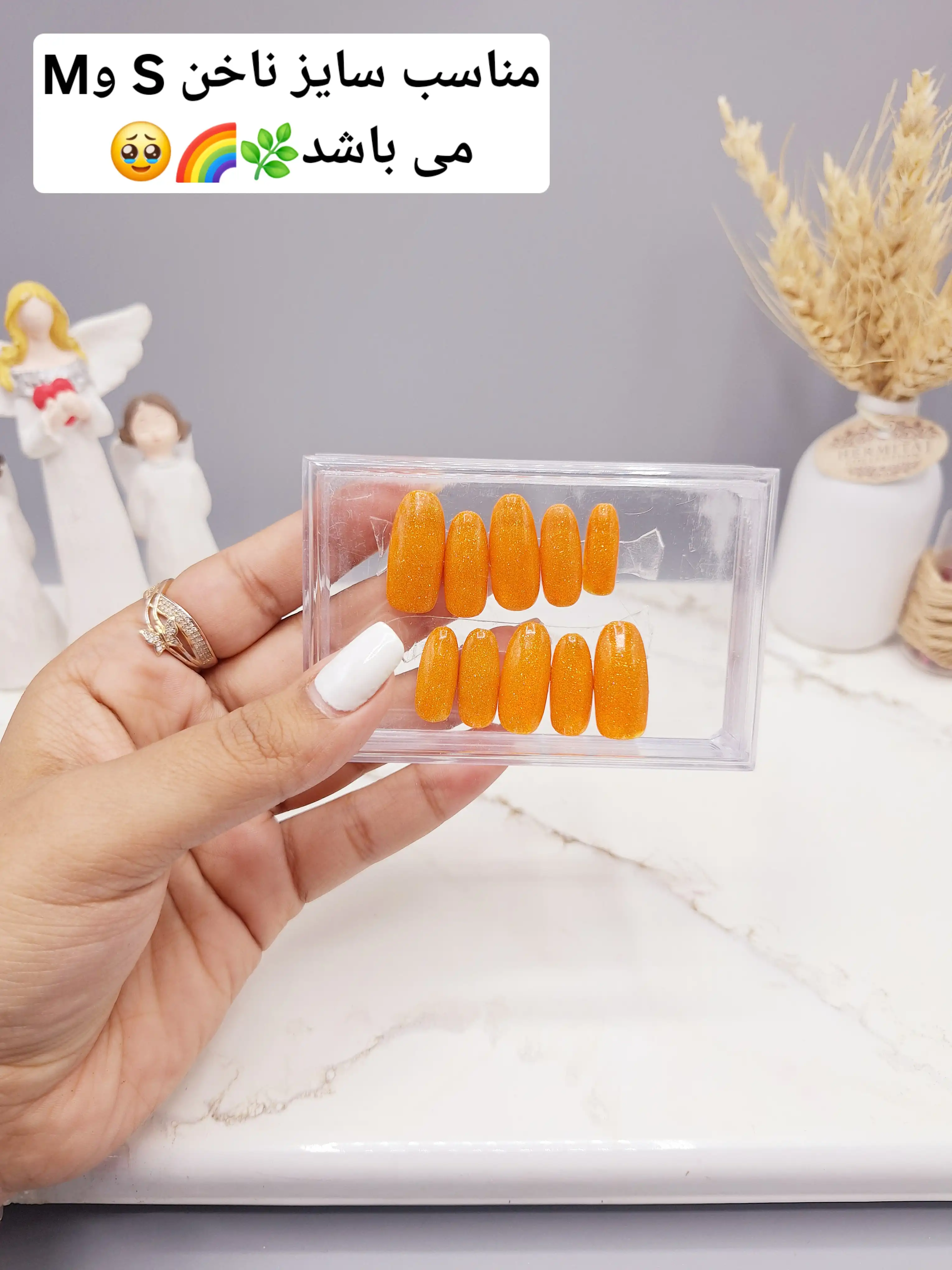 ناخن مصنوعی با مواد کاشت درجه ۱ طرح ساده و شیک رنگ نارنجی شاین دار (به همراه پک اختصاصی)